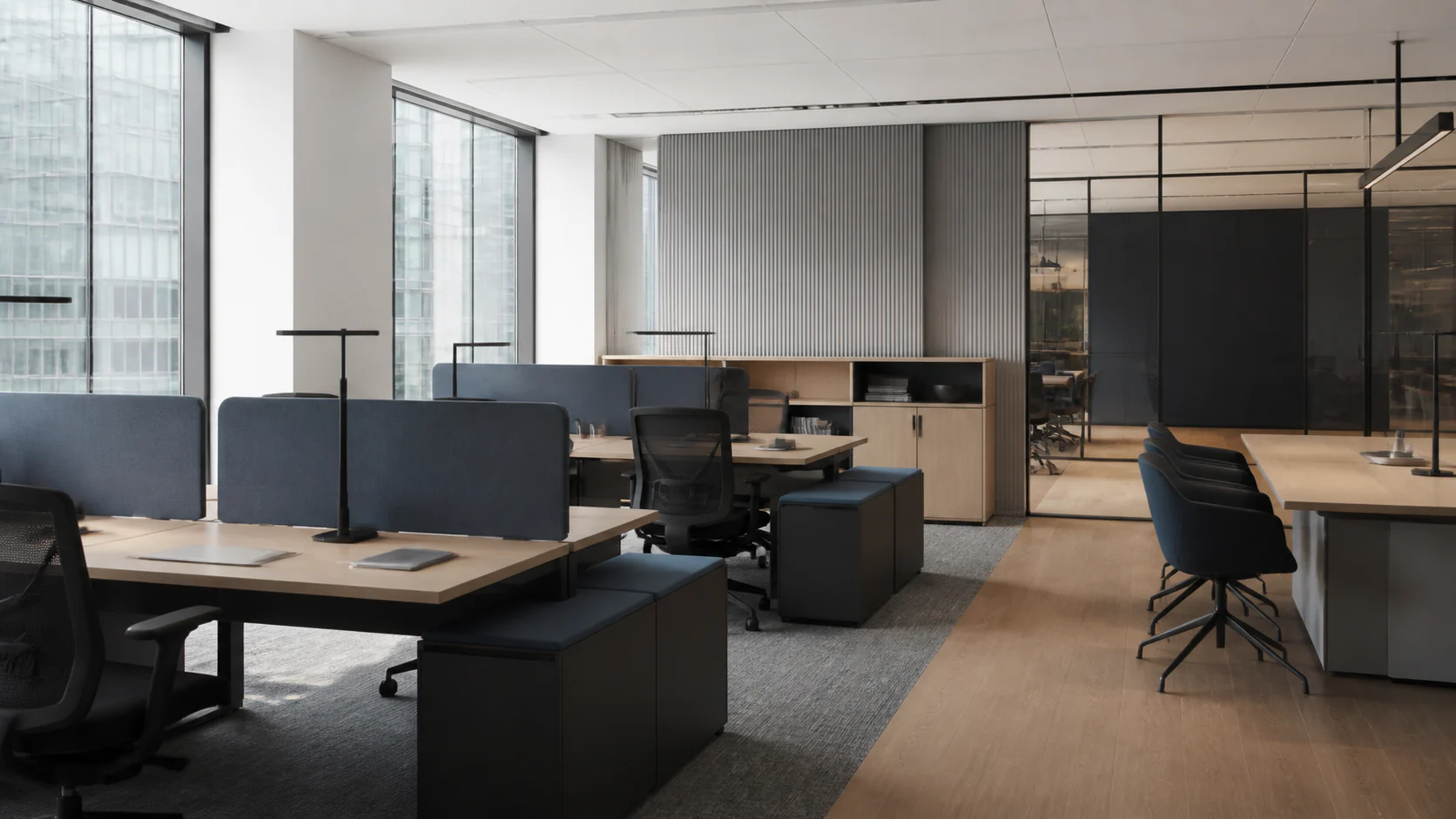Contemporary commercial office with workstations, ergonomic seating and meeting furniture
